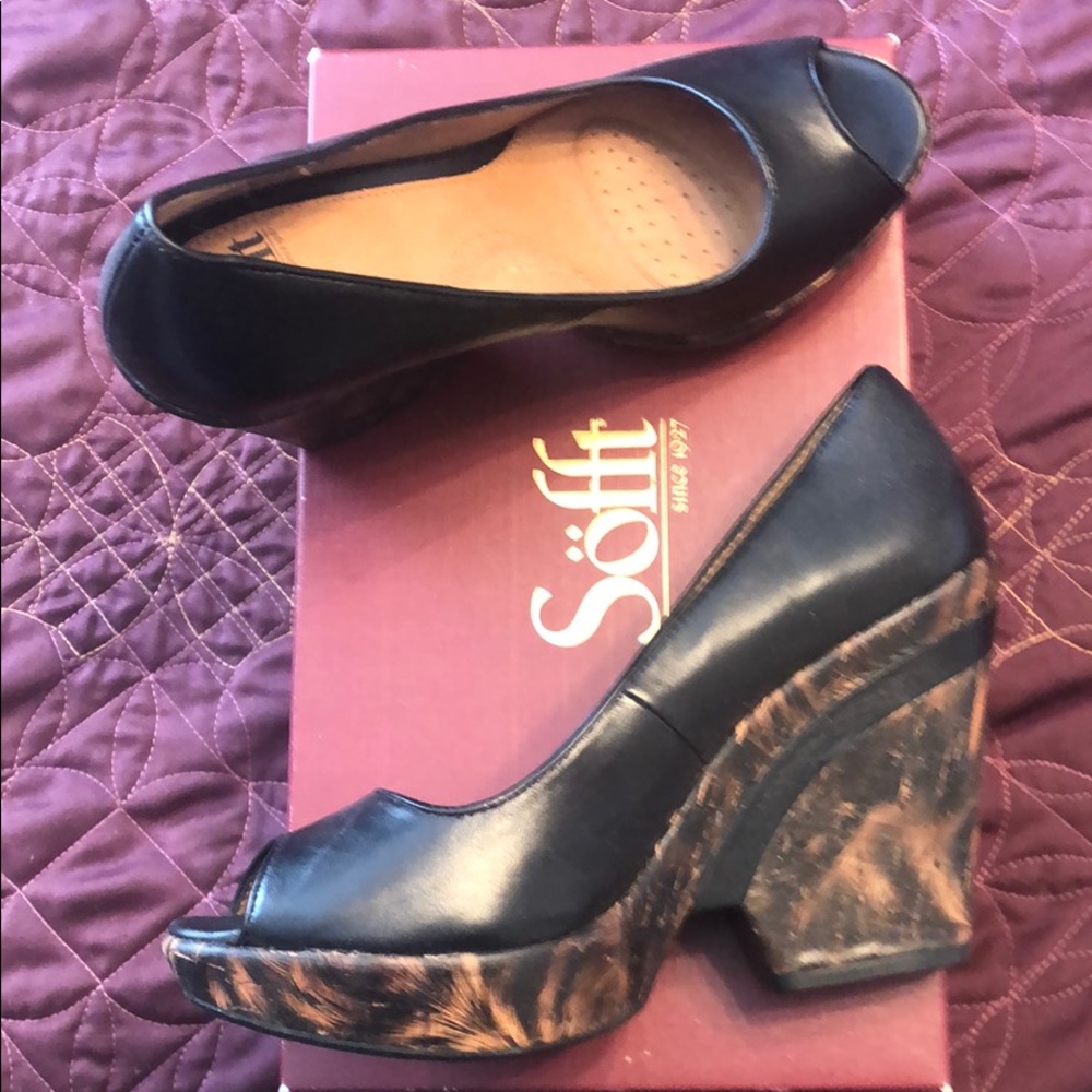 Sofft black heels with open toe and wood accents.